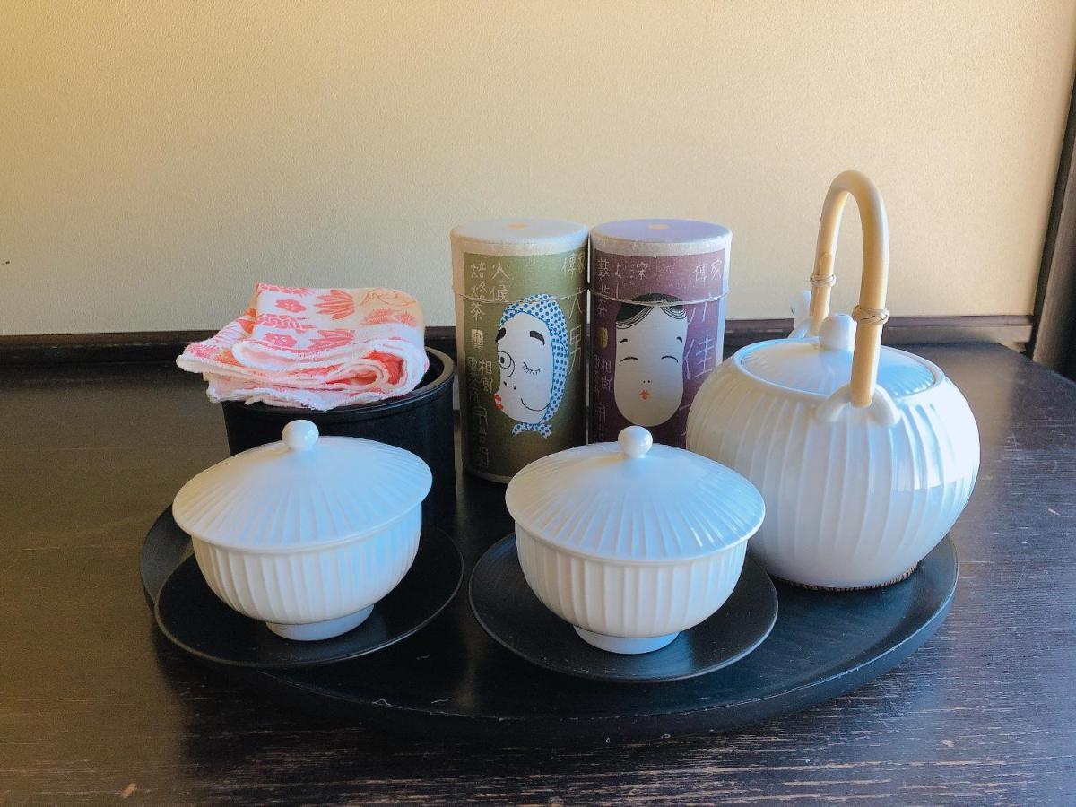 Arima Onsen Tocen Goshobo Hotel Кобе Екстериор снимка A set of Japanese tableware